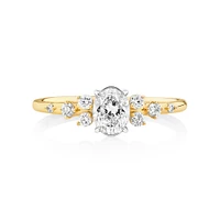 Bague à halo ovale en or blanc et jaune 14 K à diamants dispersés totalisant 0,63 ct