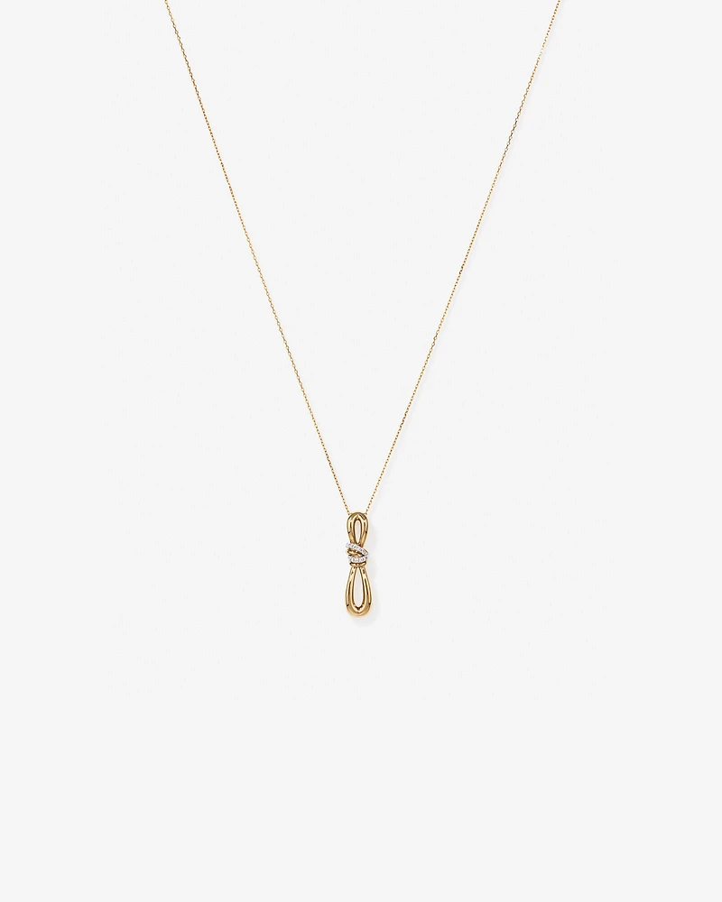 0.07 Carat TW Diamond Knots Pendant in 10kt Yellow Gold