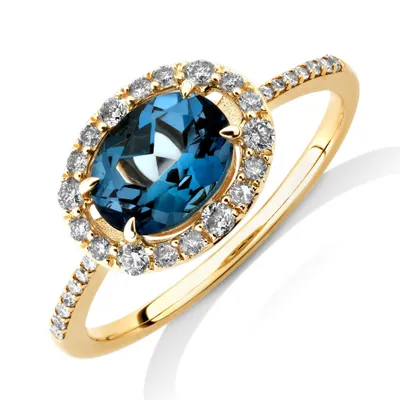 Halo Ring with London Blue Topaz & 0.25 Carat TW of Diamonds 10kt Yellow Gold