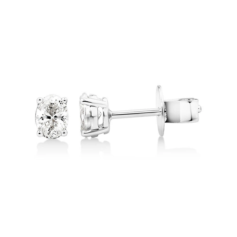 0.50 Carat TW Oval Cut Diamond Solitaire Stud Earrings in 18kt White Gold