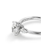 0.77 Carat TW Oval & Marquise Cut Three Stone Engagement Ring in 18kt White Gold