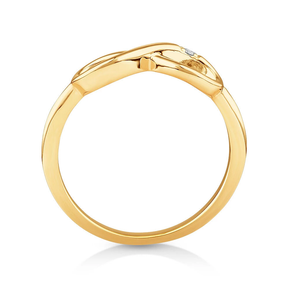 Bague infini ornée d'un diamant en or jaune 10kt