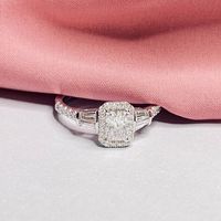 Perla. 1ctw. Pear-Shaped Diamond Halo Engagement Ring in 14K White Gold