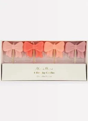 Pink bow candles