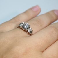 Round Cut Solitaire with Baguette and Marquise Diamonds