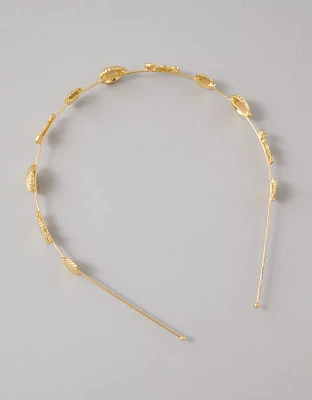 Bandeau orné d’un coquillage doré AE