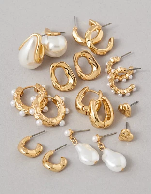 Emballage de neuf paires de boucles d’oreille dorées et à perles AEO