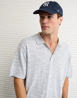 Polo en tricot teint par espacement AE