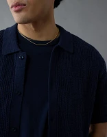 Polo en tricot boutonné à damier Fin de semaine AE