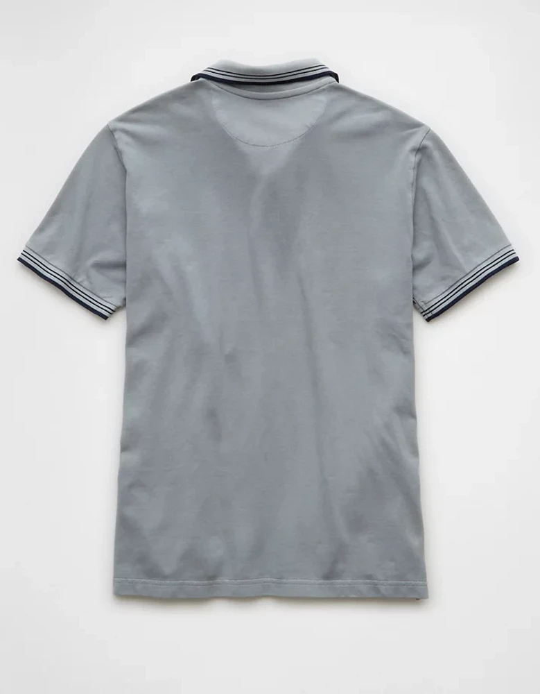 Polo extensible à bordures contrastantes en piqué AE