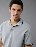 Polo extensible à bordures contrastantes en piqué AE