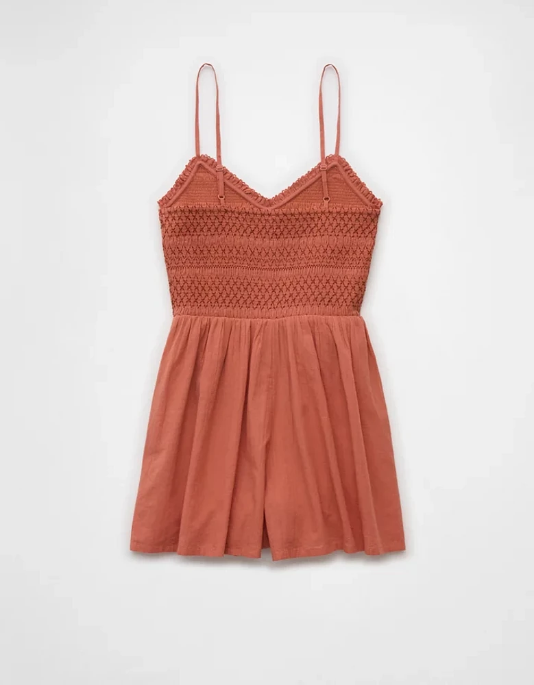 Barboteuse texturée à encolure en V et smocks AE