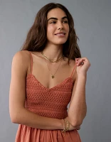 Barboteuse texturée à encolure en V et smocks AE