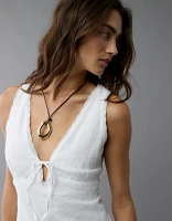 Minirobe à enfiler nouée l’avant AE