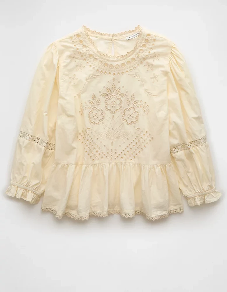 Blouse à col montant avec motifs ajourés AE