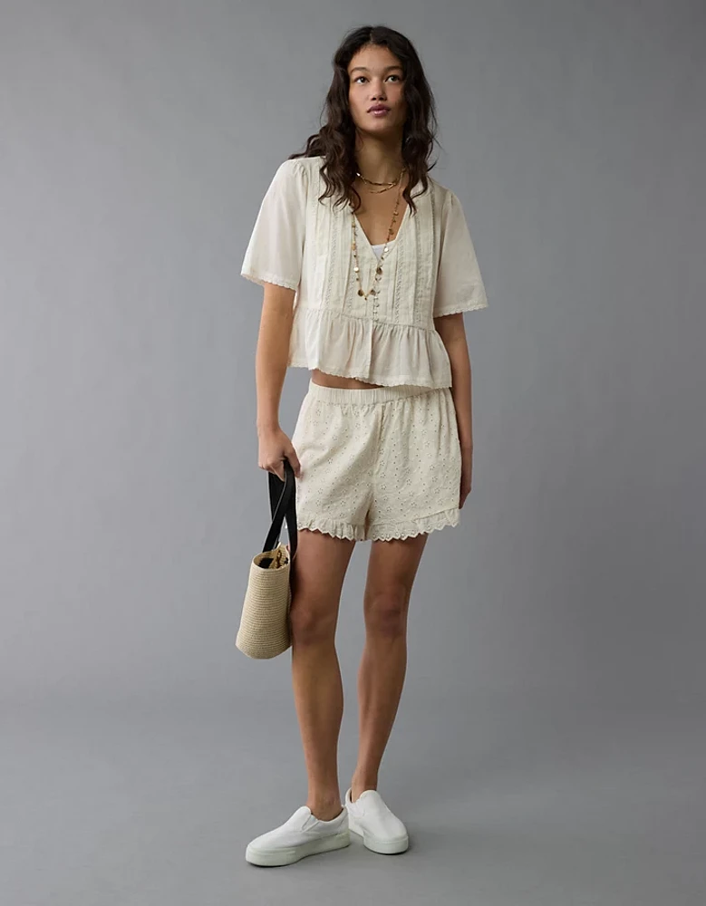Short à taille haute et œillets avec volants AE
