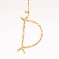 Gold Monogram Ornament D