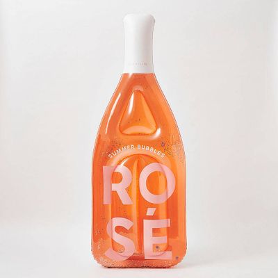 Rose Bottle Lie On Pool Float