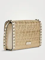 Small Rockstud Bouclé Raffia Crossbody Bag