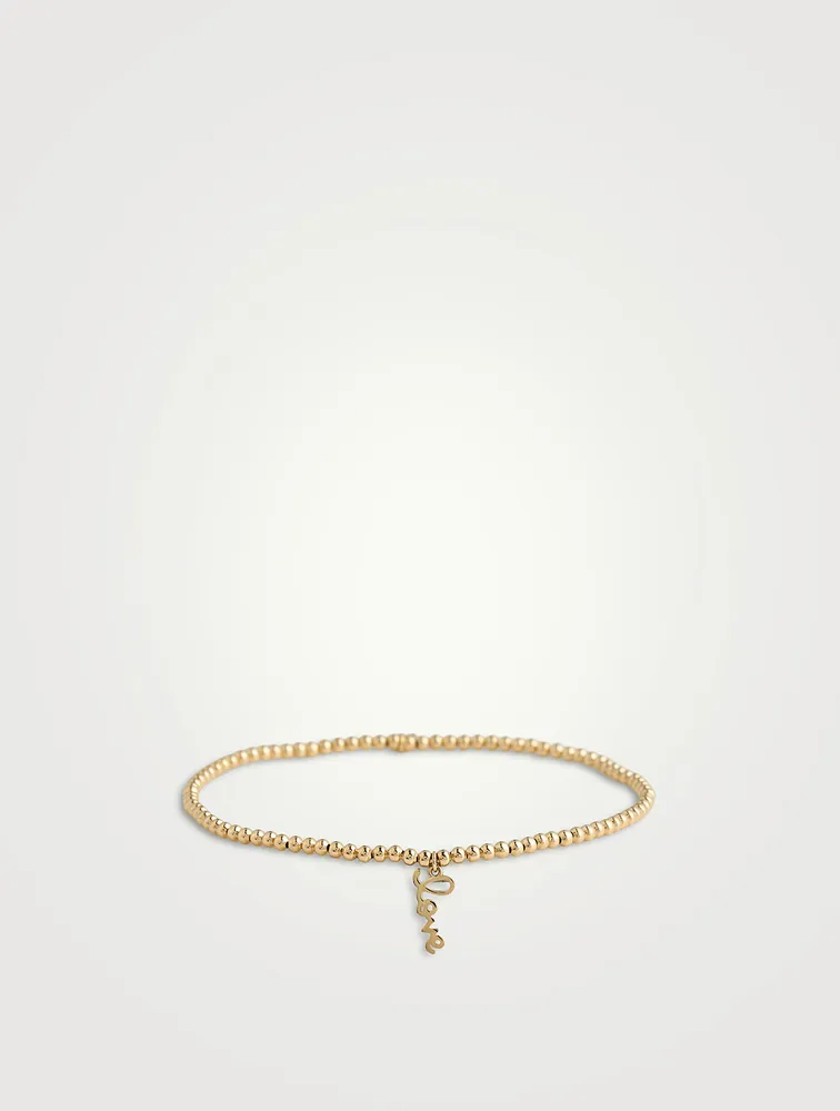 Beaded Bracelet With 14K Gold Tiny Pure Love Charm