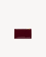 CASSANDRE MATELASSÉ FRAGMENTS flap card case in patent leather