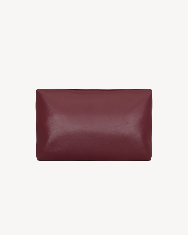CASSANDRE large envelope pouch in shiny leather