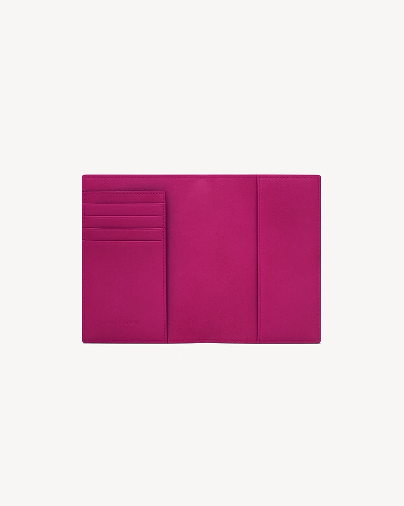 SAINT LAURENT PARIS PASSPORT CASE IN shiny leather