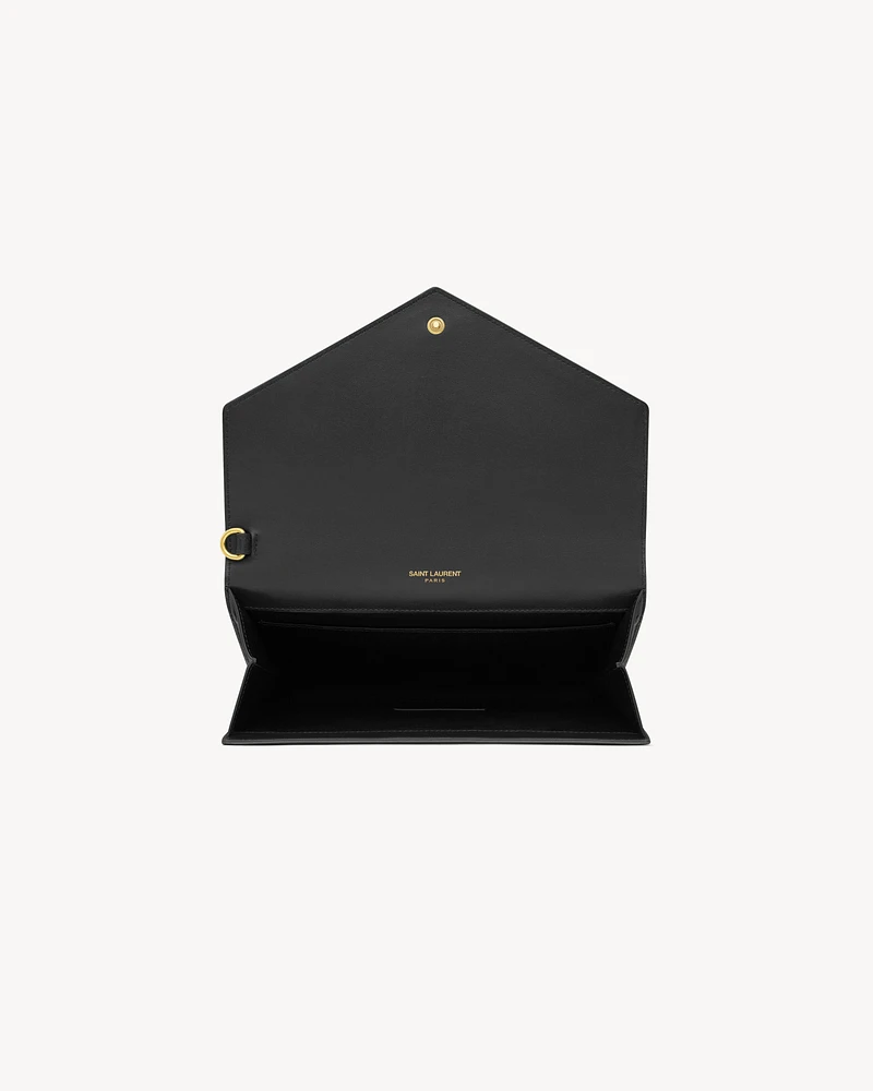 CASSANDRE flap pouch in crocodile-embossed shiny leather