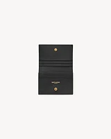 CASSANDRE MATELASSÉ FLAP CARD CASE IN GRAIN DE POUDRE LEATHER