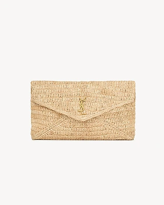CASSANDRE large envelope pouch in raffia