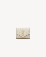 CASSANDRE MATELASSÉ MULTI-FOLDED WALLET IN GRAIN DE POUDRE LEATHER