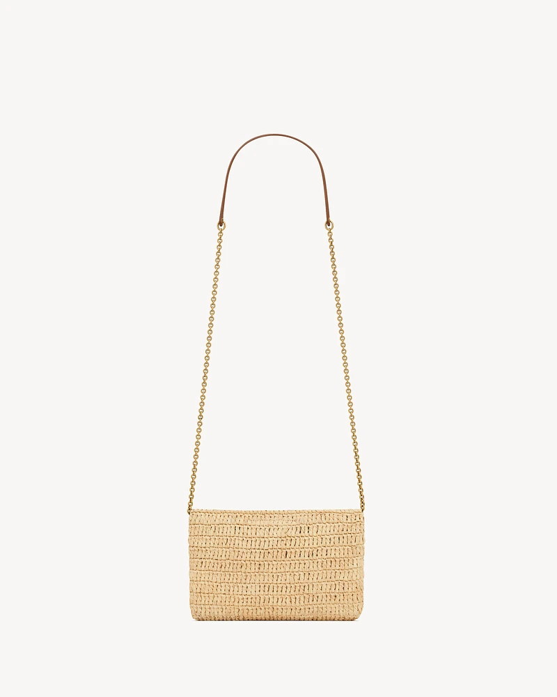 CASSANDRE chain pouch in raffia