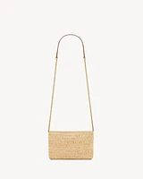 CASSANDRE chain pouch in raffia