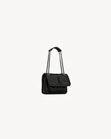 NIKI micro bag in leather