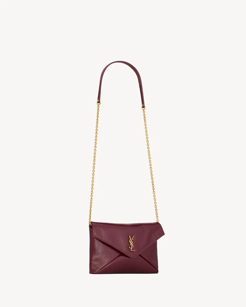CASSANDRE chain pouch in shiny leather