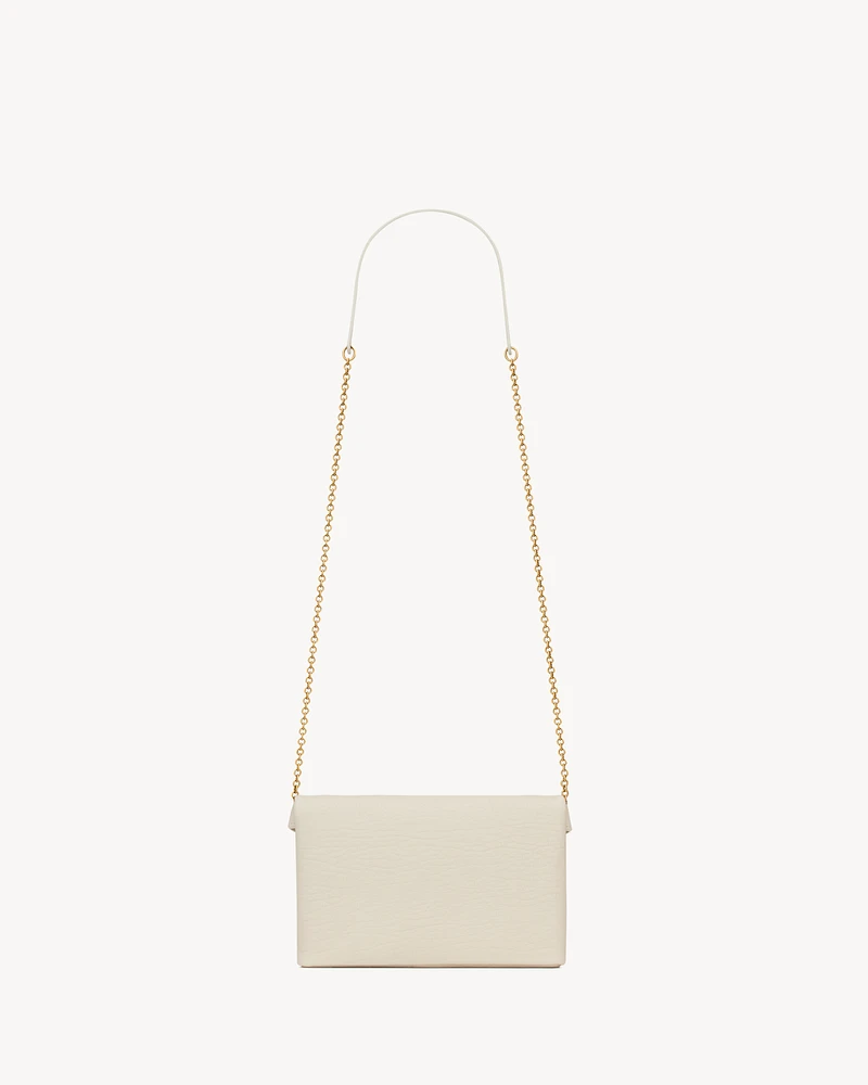 CASSANDRE chain clutch in lambskin
