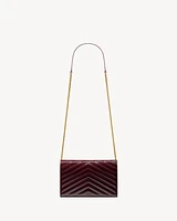 CASSANDRE envelope chain wallet in patent leather