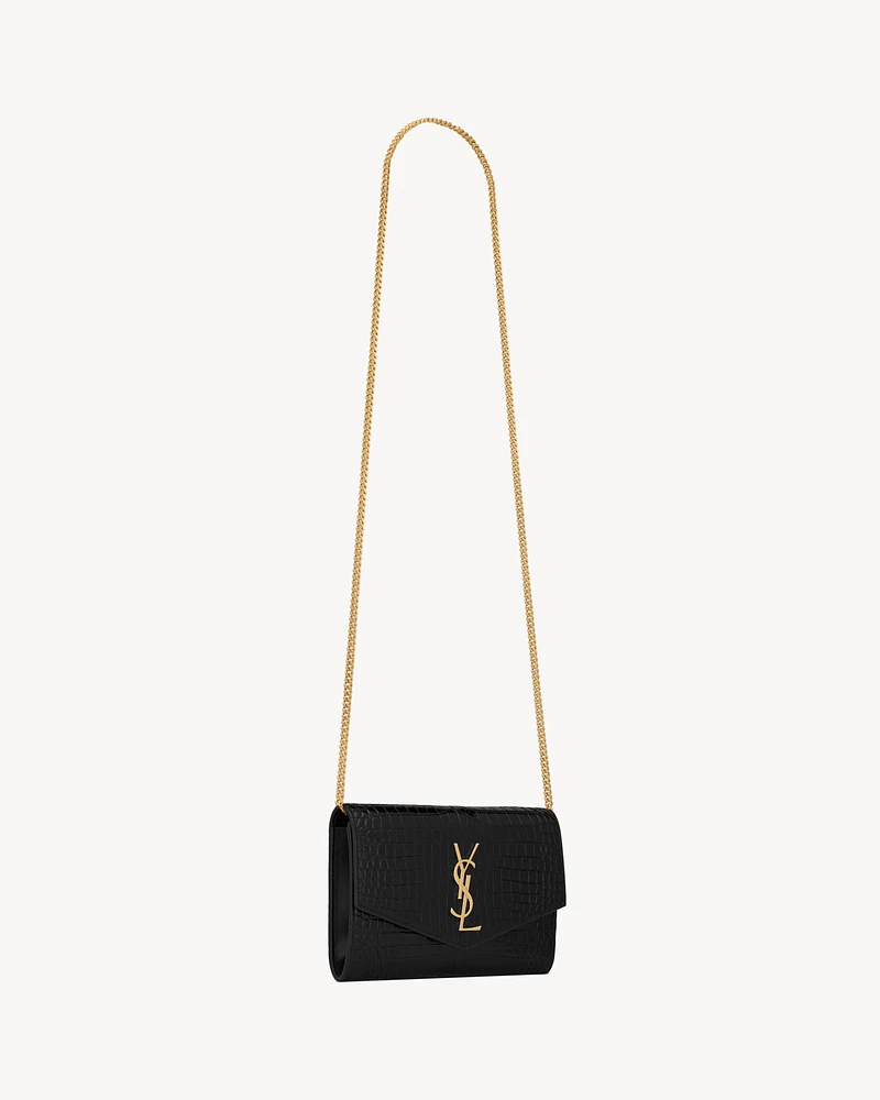 Uptown chain wallet in shiny crocodile-embossed leather