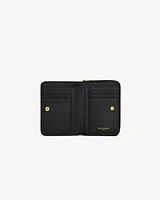 CASSANDRE MATELASSÉ compact zip-around wallet in lambskin
