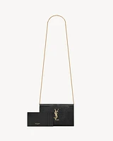 Uptown chain wallet in shiny crocodile-embossed leather