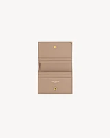 CASSANDRE MATELASSÉ FLAP CARD CASE IN LAMBSKIN