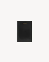 SAINT LAURENT PARIS PASSPORT CASE IN LACQUERED LEATHER