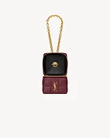 CASSANDRE MATELASSÉ CARRÉ mini cube on chain in shiny leather