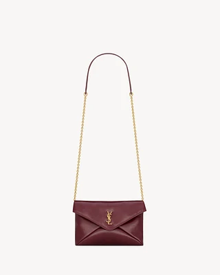 CASSANDRE chain pouch in shiny leather