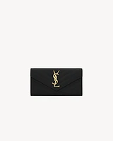 CASSANDRE MATELASSÉ LARGE FLAP WALLET IN GRAIN DE POUDRE LEATHER