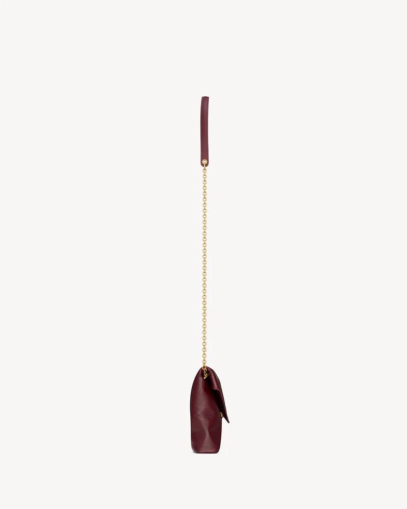 CASSANDRE chain pouch in shiny leather