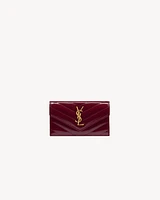 CASSANDRE MATELASSÉ FRAGMENTS flap card case in patent leather