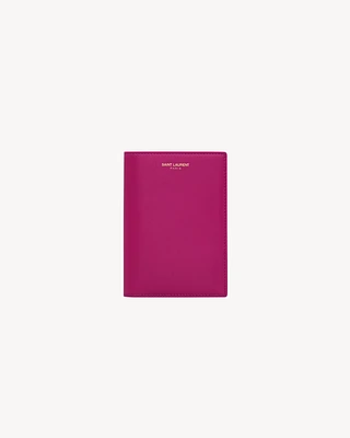 SAINT LAURENT PARIS PASSPORT CASE IN shiny leather