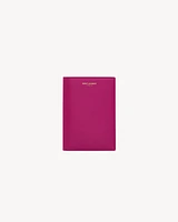 SAINT LAURENT PARIS PASSPORT CASE IN shiny leather