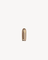 CASSANDRE MATELASSÉ compact zip around wallet in grain de poudre leather